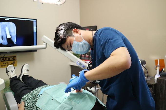 Dr. Kim performing implant and restorative dental work at ReDefine Dentistry